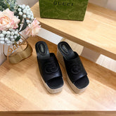 HIGH 10CM WEDGE SANDALS IN BLACK SHEEPSKIN